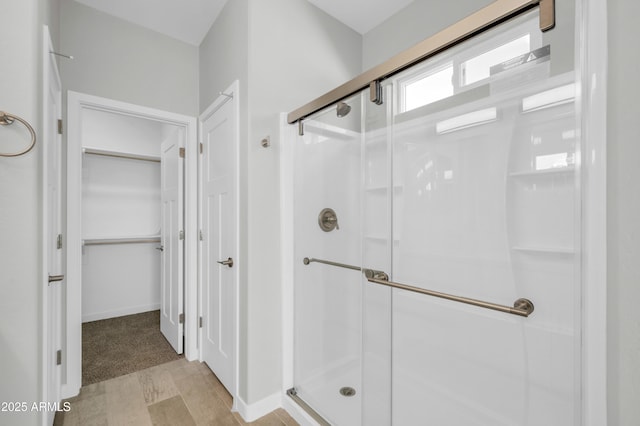 bathroom featuring a stall shower