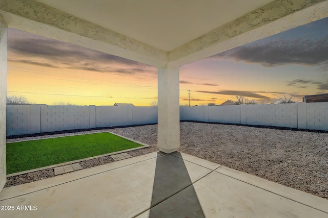 exterior space featuring a patio area and a fenced backyard