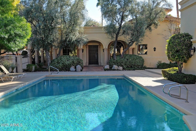 view of pool featuring a patio area