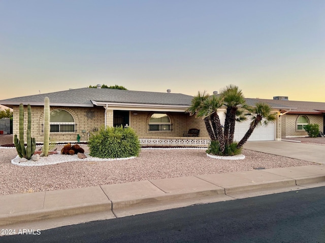 view of front of home with a garage