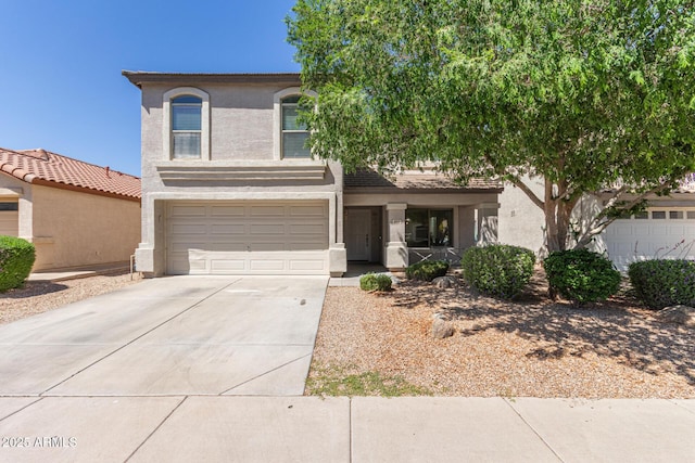 view of front of home featuring stucco siding, an attached garage, a porch, and concrete driveway