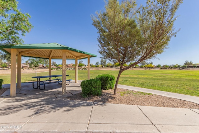 view of home's community with a gazebo and a lawn