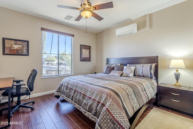 bedroom featuring ceiling fan, an AC wall unit, and hardwood / wood-style flooring