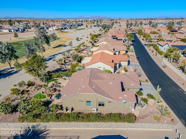 birds eye view of property featuring a mountain view