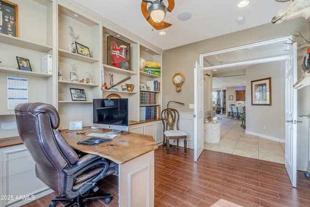 office featuring ceiling fan and built in features