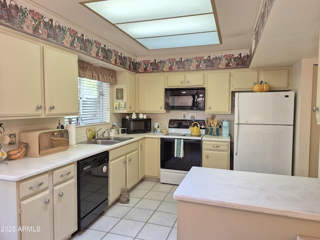 1118 E Orangewood Ave, Phoenix, AZ 85020 - kitchen with black appliances, a sink, cream cabinetry, light countertops, and light tile patterned flooring