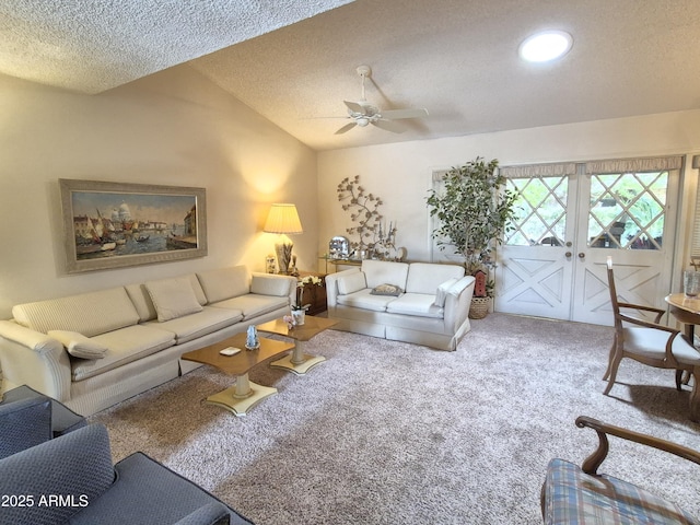 1118 E Orangewood Ave, Phoenix, AZ 85020 - carpeted living area featuring a ceiling fan, vaulted ceiling, a textured ceiling, and french doors