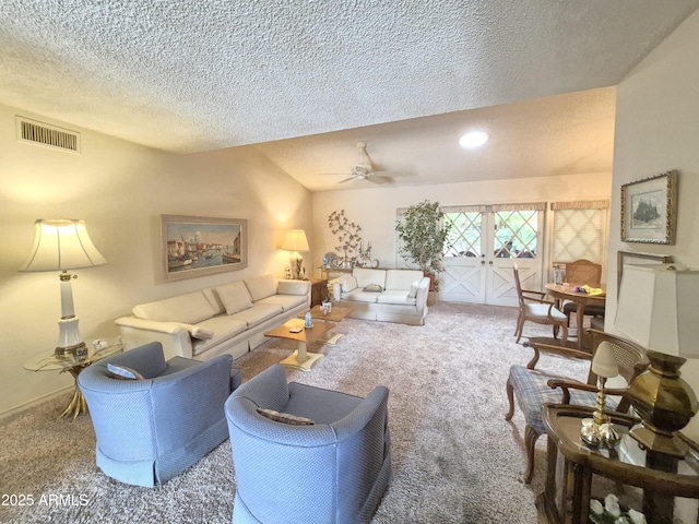 1118 E Orangewood Ave, Phoenix, AZ 85020 - carpeted living room featuring a textured ceiling, french doors, a ceiling fan, and baseboards