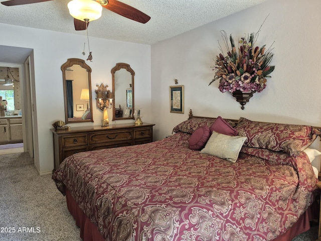 1118 E Orangewood Ave, Phoenix, AZ 85020 - bedroom with light carpet, a textured ceiling, and ceiling fan