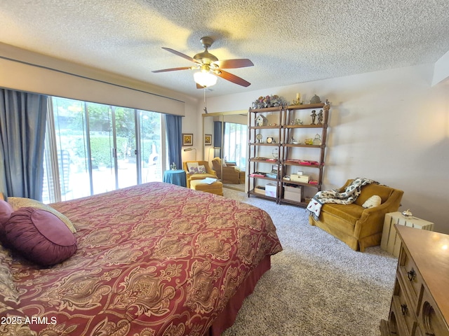 1118 E Orangewood Ave, Phoenix, AZ 85020 - carpeted bedroom with a textured ceiling, access to exterior, and a ceiling fan