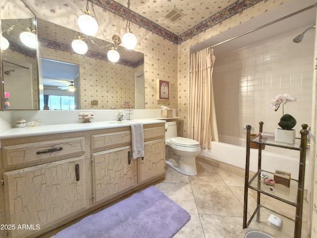 1118 E Orangewood Ave, Phoenix, AZ 85020 - full bathroom featuring wallpapered walls, tile patterned flooring, shower / bathtub combination with curtain, vanity, and toilet