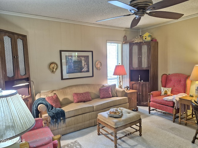1118 E Orangewood Ave, Phoenix, AZ 85020 - living room with ornamental molding, carpet, ceiling fan, and a textured ceiling