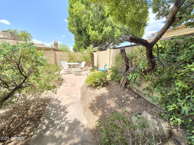 1118 E Orangewood Ave, Phoenix, AZ 85020 - fenced backyard featuring a patio area