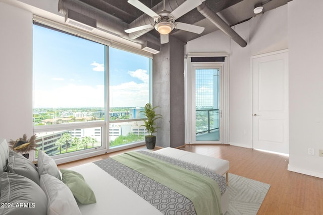 bedroom featuring ceiling fan and light hardwood / wood-style flooring