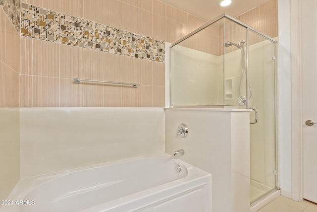 bathroom with independent shower and bath