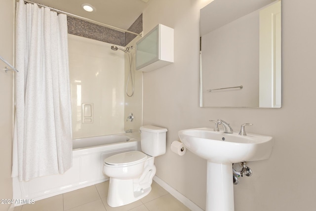 full bathroom with tile patterned flooring, sink, shower / tub combo, and toilet