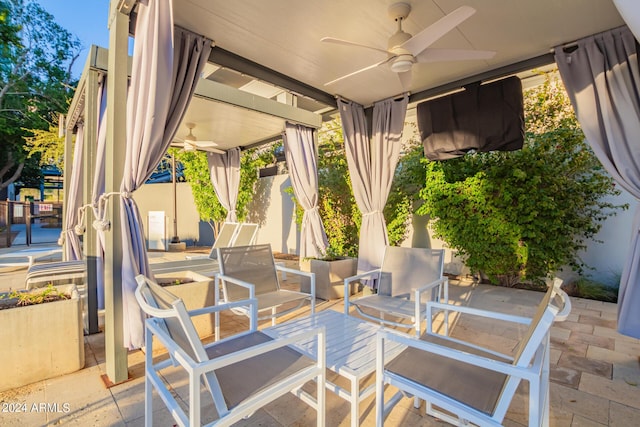 view of patio / terrace with ceiling fan