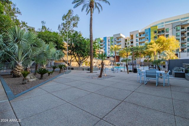 view of property's community featuring a patio area