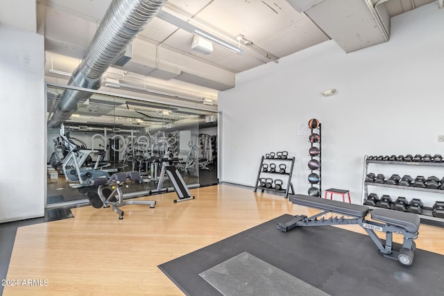 gym featuring wood-type flooring