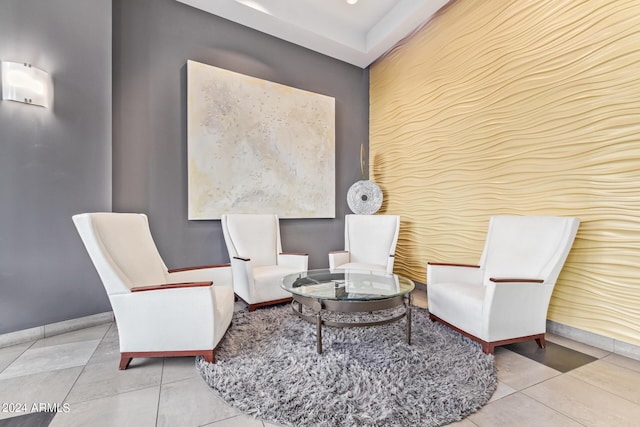 living area featuring light tile patterned floors