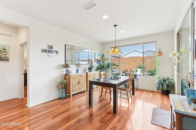 dining space with visible vents, recessed lighting, and light wood-style floors