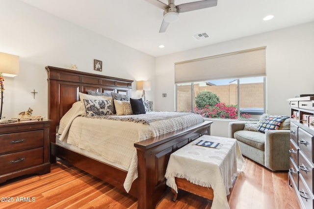 bedroom with recessed lighting, visible vents, light wood-style flooring, and a ceiling fan