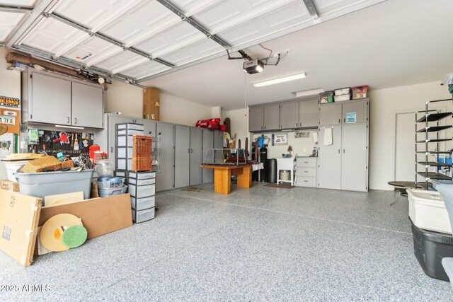 garage featuring a garage door opener