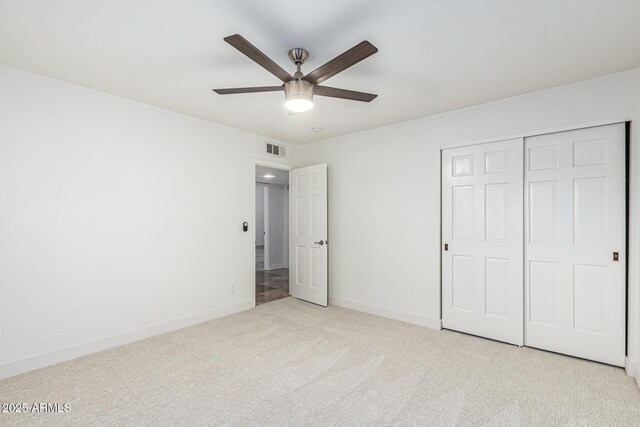 6119 E Sandra Ter, Scottsdale, AZ 85254 - unfurnished bedroom with carpet, a closet, baseboards, and ceiling fan