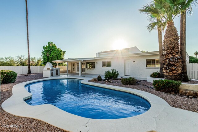 6119 E Sandra Ter, Scottsdale, AZ 85254 - view of pool with a fenced backyard, a patio, area for grilling, and french doors