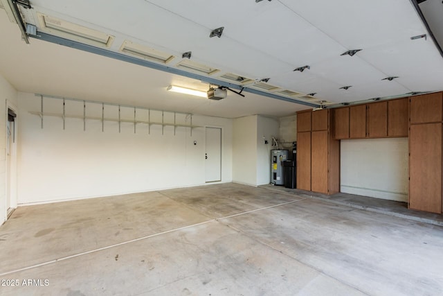 6119 E Sandra Ter, Scottsdale, AZ 85254 - garage with electric water heater and a garage door opener