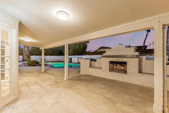 6119 E Sandra Ter, Scottsdale, AZ 85254 - fenced backyard featuring an outdoor stone fireplace and a patio