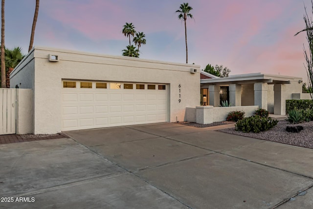6119 E Sandra Ter, Scottsdale, AZ 85254 - view of front facade featuring stucco siding and concrete driveway