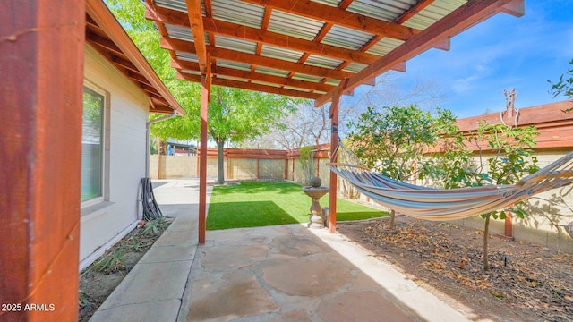 view of patio featuring a fenced backyard