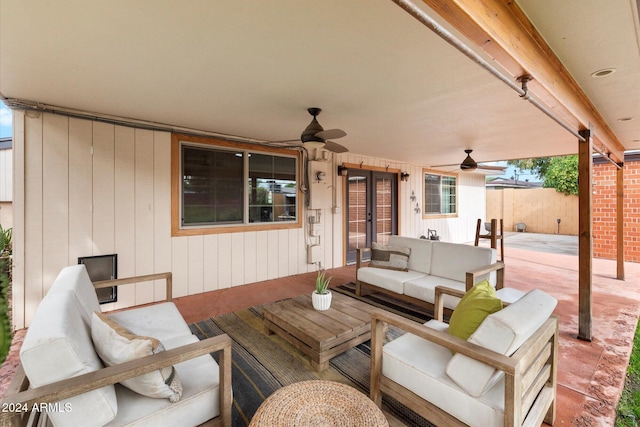 view of patio with an outdoor living space and french doors