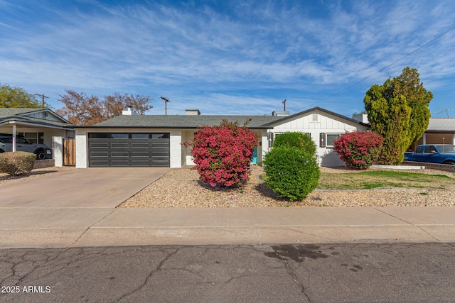 single story home featuring a garage