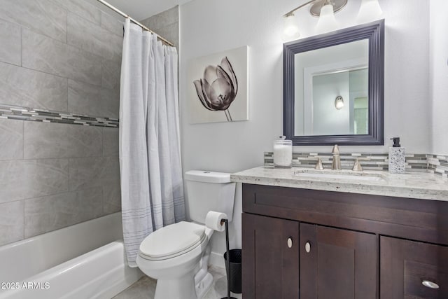 full bathroom with vanity, toilet, and shower / bath combo with shower curtain