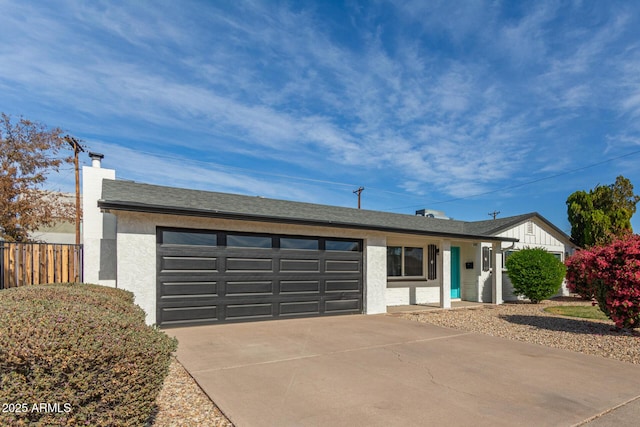 ranch-style home with a garage