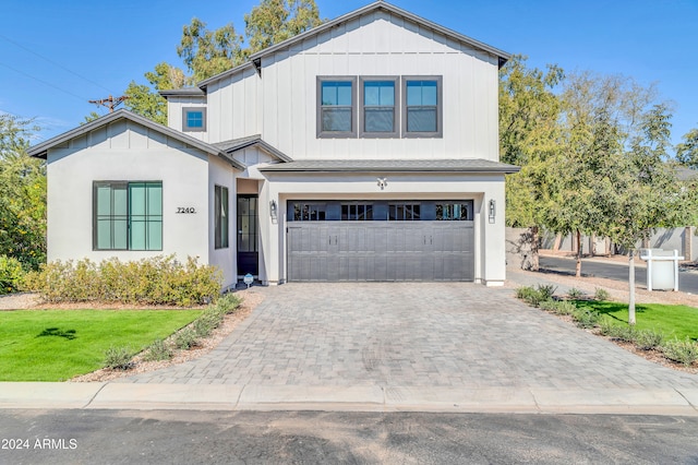 view of front of property with a garage