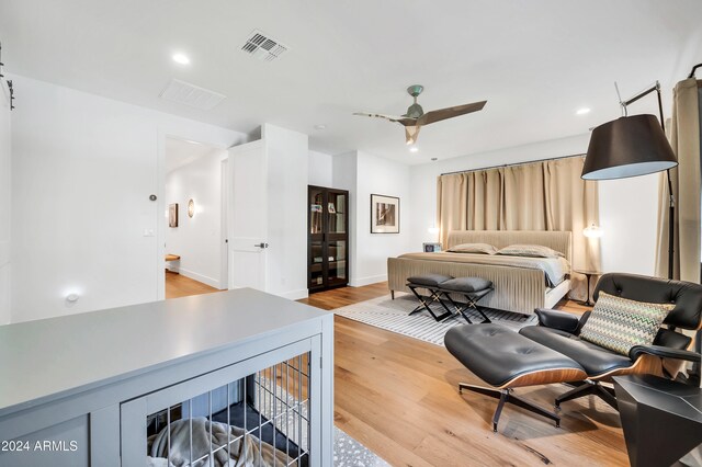 bedroom featuring ceiling fan and light hardwood / wood-style flooring