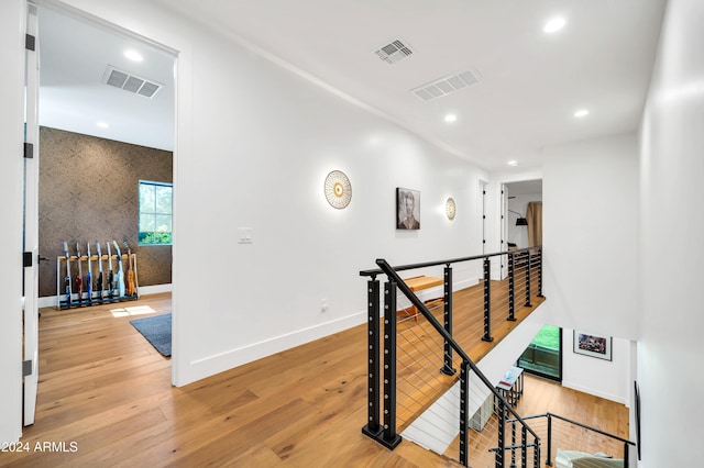 corridor featuring wood-type flooring