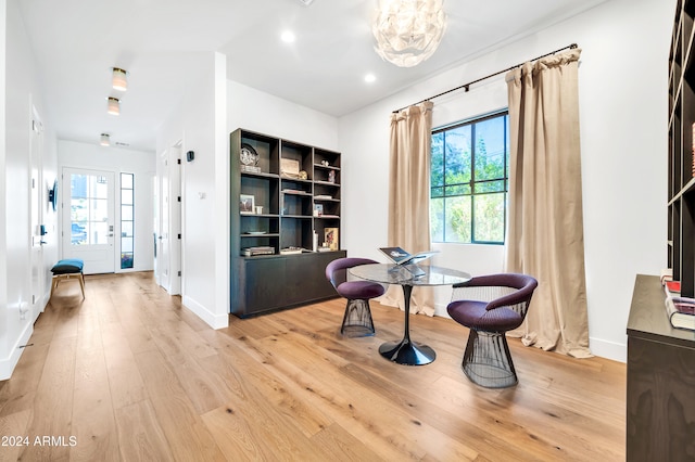 living area with light hardwood / wood-style floors