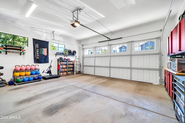 garage featuring a garage door opener