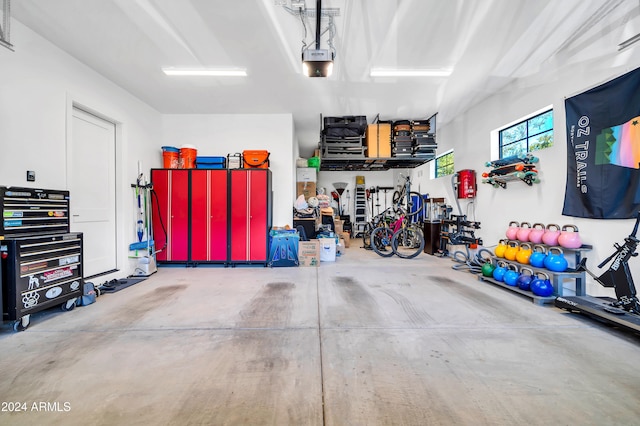 garage featuring a garage door opener