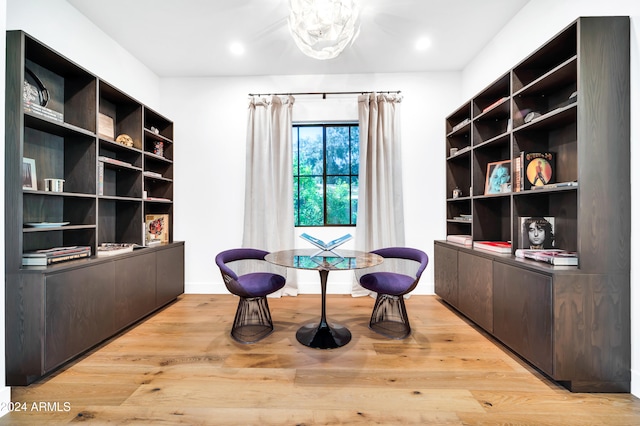 living area with light hardwood / wood-style flooring