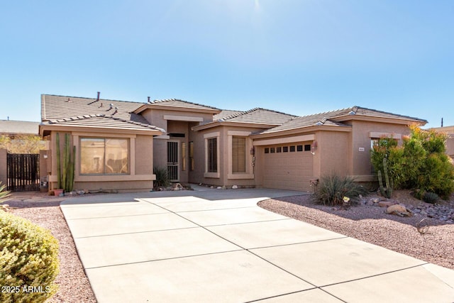 prairie-style house featuring a garage