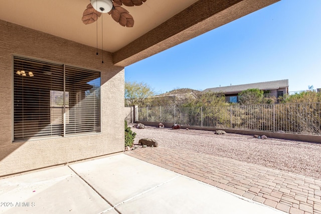 view of patio with ceiling fan