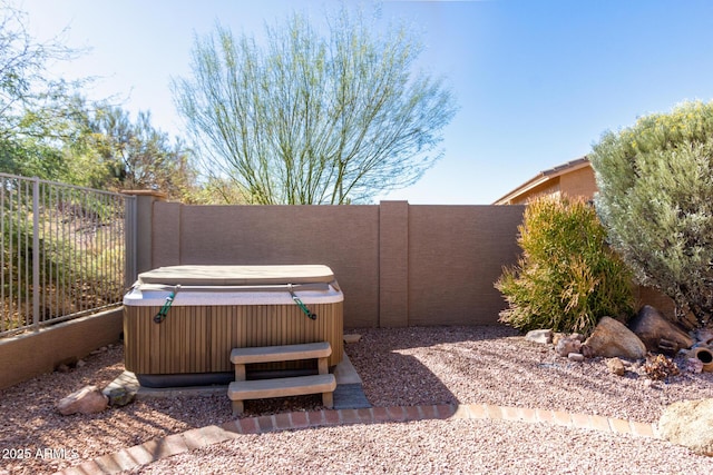 view of patio with a hot tub