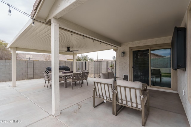 view of patio / terrace featuring ceiling fan