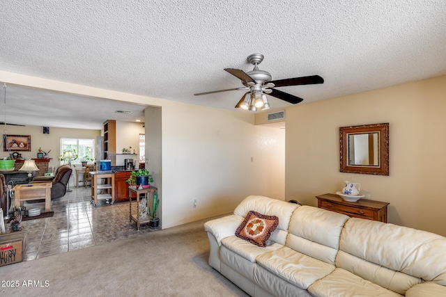 7210 W Caron Dr, Peoria, AZ 85345 - living room featuring a ceiling fan and a textured ceiling