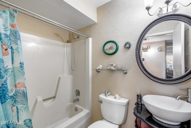 7210 W Caron Dr, Peoria, AZ 85345 - full bathroom featuring a sink, shower / bath combo, toilet, and a textured wall